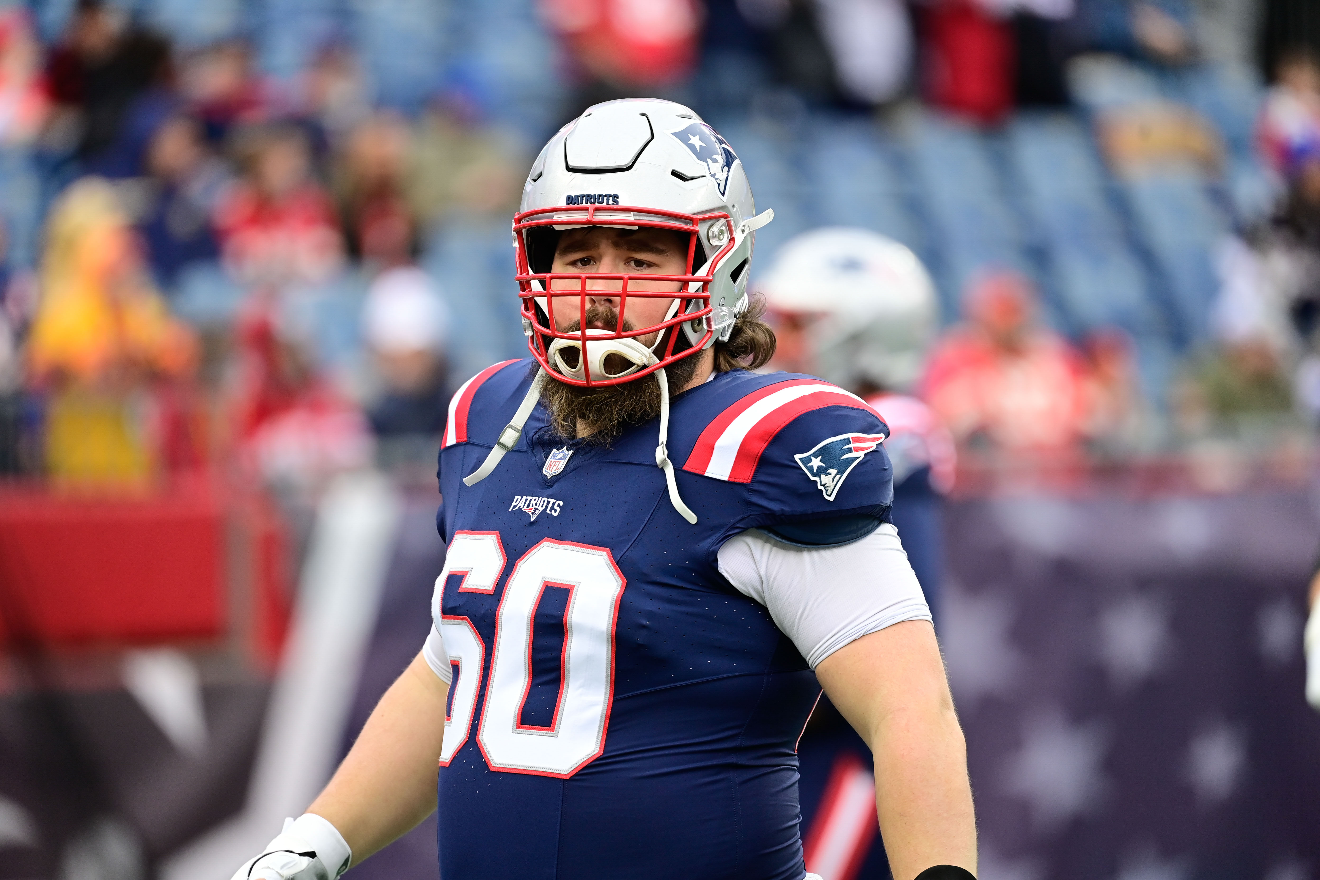 Dec 17, 2023; Foxborough, Massachusetts, USA; New England Patriots center David Andrews (60) warms up before a game against the Kansas City Chiefs at Gillette Stadium. 